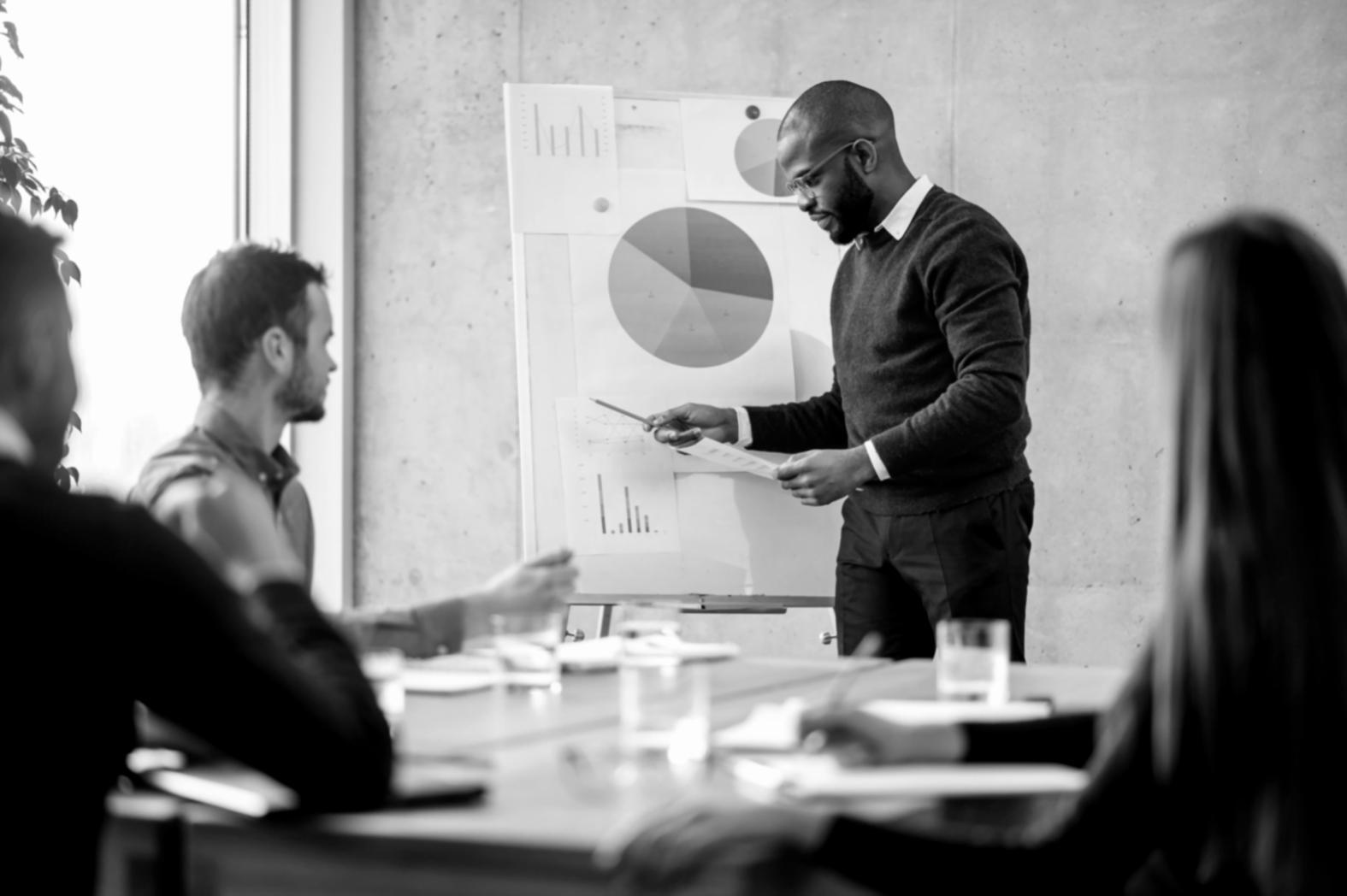 Student analyzing financial documents at desk